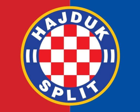 Official Hajduk Split football club crest against a red and blue background.
