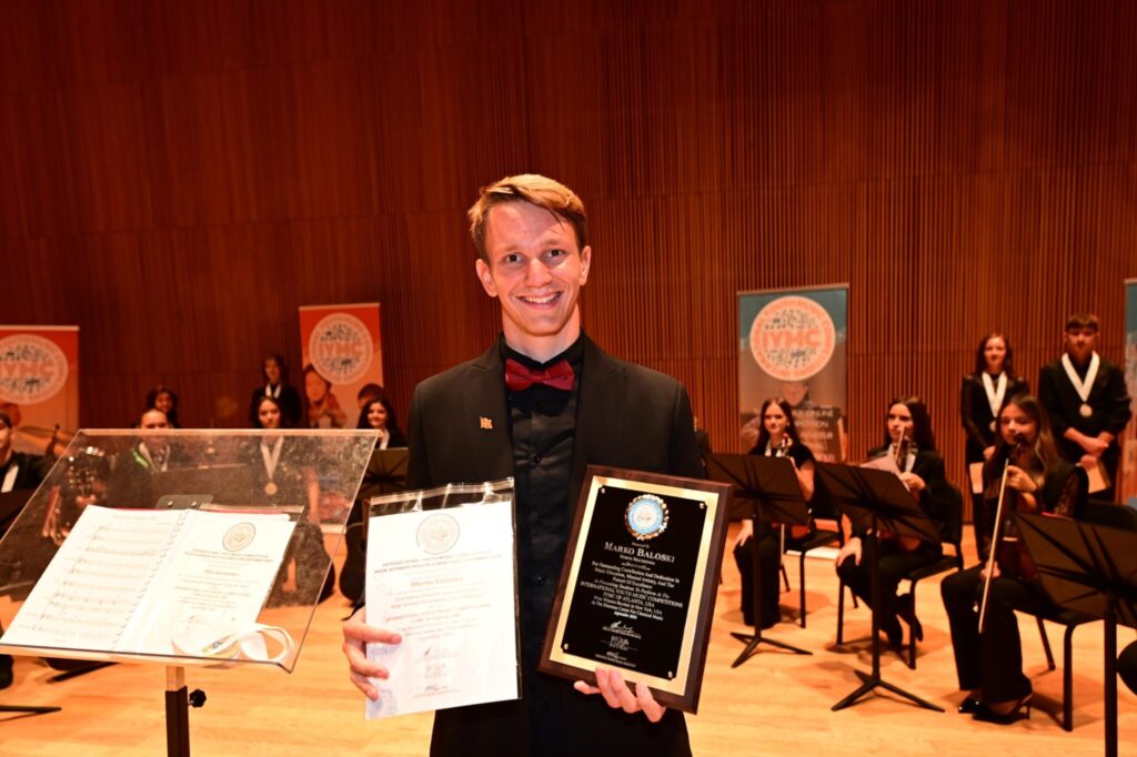 Marko Baloski with an award after an international music competition