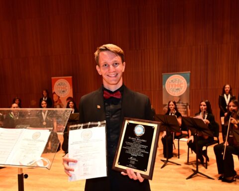 Marko Baloski with an award after an international music competition