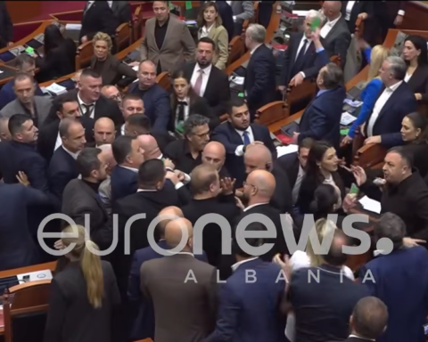 Albanian lawmakers confront each other during a heated parliamentary session in Tirana.