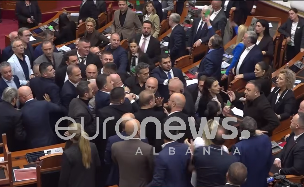 Albanian lawmakers confront each other during a heated parliamentary session in Tirana.