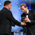 Harry Kane receiving the Ballon d'Or trophy during the 2026 awards ceremony.