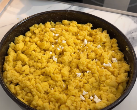 Traditional Macedonian kachamak made from yellow cornmeal and topped with crumbled white cheese.