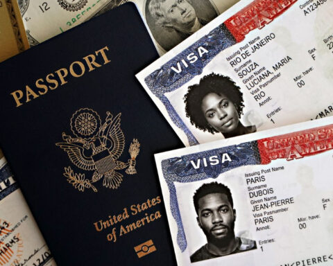 US passport and visa documents illustrating American immigration and work permit policies US passport and visa documents illustrating American immigration and work permit policies